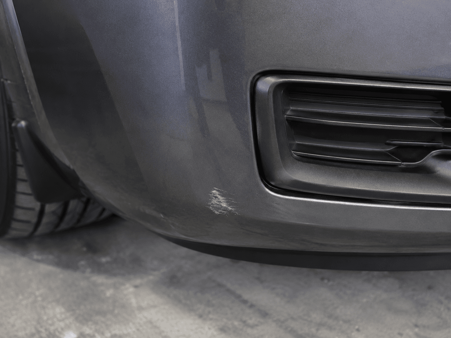 Truthful close view of a visible bumper scuff
